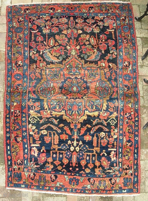 Kolyai-- 4 ft 4 x 6 ft 8 in. Tribal version of classic west Persian art deco floral spray.  Thick and plush with lots of abrashes. Call me for concise in  ...