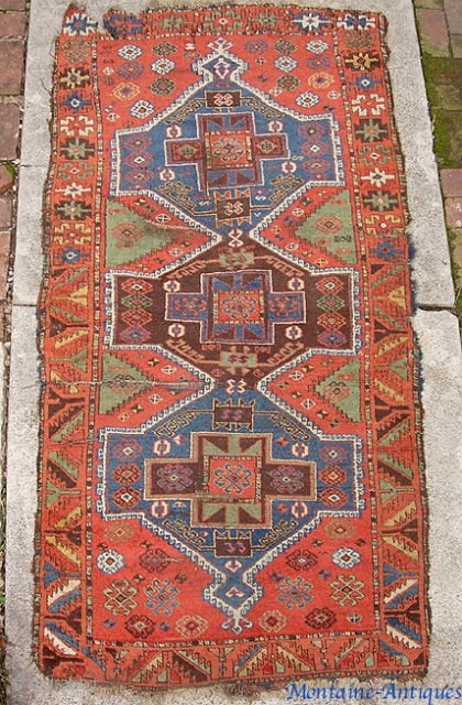Circa 1850 Yuruk,  3 ft 4 in x 7 ft 2 inches.  A genuinely ancient thing with gorgeous colors.  As found condition and the photos tell the story. $20  ...
