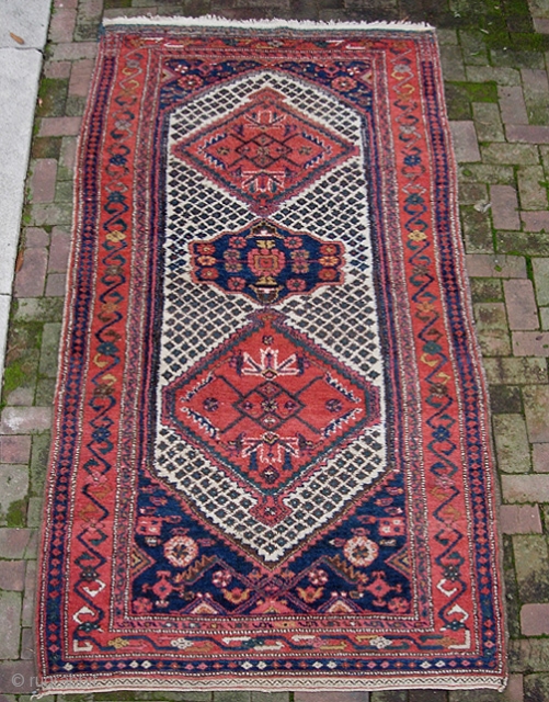 Kurd 4 ft 6 inches x 8 ft 10 inches. Useful size. Very lively and decorative with diapered white field. Somewhat coarsely woven w/ heavy thick pile; charming and vernacular. Excellent condition  ...