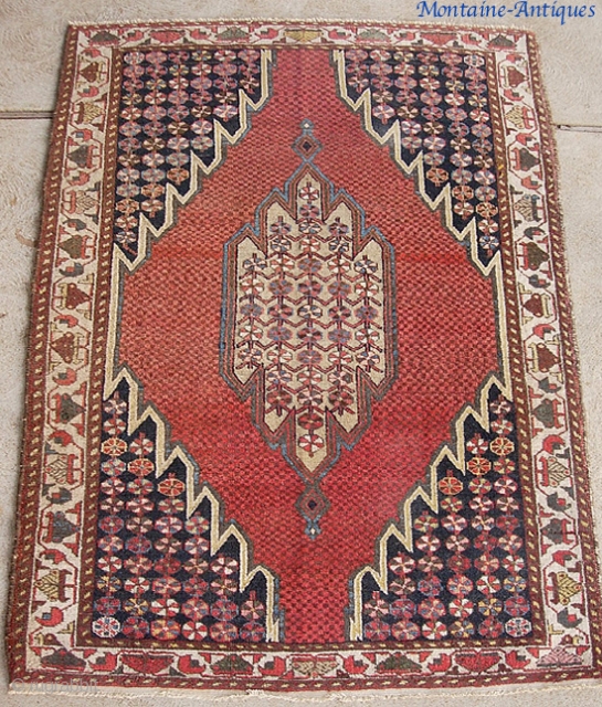 Mazlaghan 4 ft 3 by 6 ft 6. checkerboard medallion. Even pile w/ no foundation showing.                 