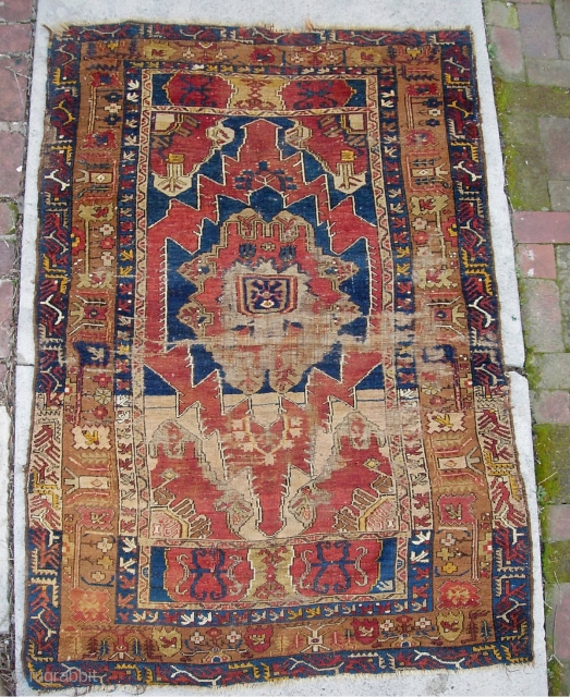 Turkish-- 3 ft 0 by 5 ft 6 inches. Dyes all natural? Not sure. In any case, a really ancient rug. You can see it is well worn. I know zero about  ...