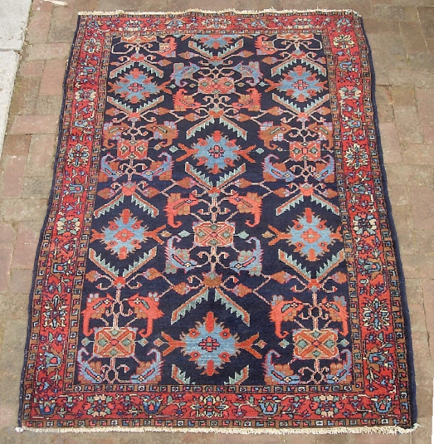 Hamadan-- 4 ft 6 inches x 6 ft 6 inches. Just an honest old Persian rug  w/ crispy design and great colors. Nice overall pile. The dogeared corner is pretty much  ...