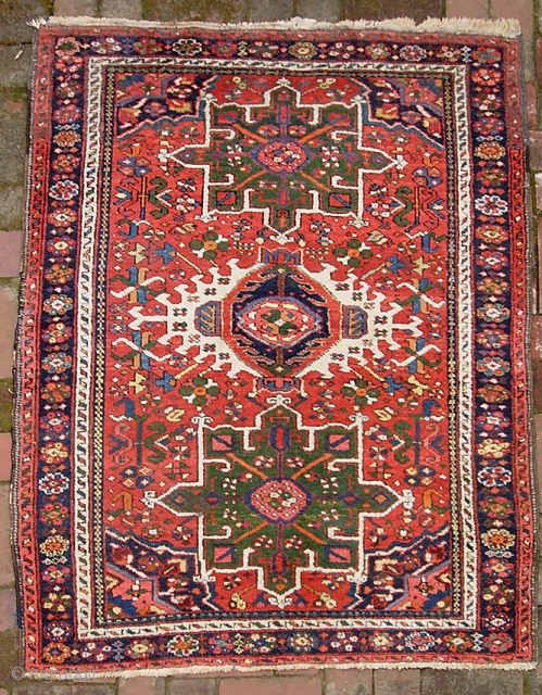 Karaja-- 3 ft 6 inches x 4 ft 6 inches. Bright and super decorative with great green medallions. Decent pile for the most part. There are a couple of small spots with  ...