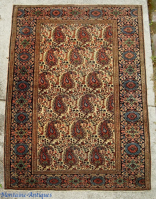 Sarouk 3 1/2 by 5 ft. Could you guess this is a Sarouk if I didn't tell you? White field with large botehs. Gotta be one of a kind. Date it around  ...