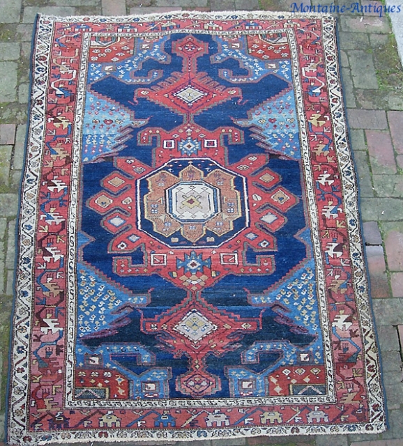 Kurdish. Possibly Northwest. 4 ft 0 inches by 6 ft 1 inches. Unusual and beautiful old thing. Note the stippling in the inner medallion. Even pile. Ends secured and sides rebound. Otherwise  ...