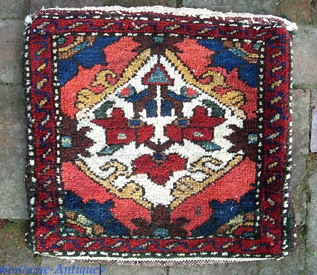 Bahktiari chanta-- 16 x 16 inches. We acquired a pile of small tribal rugs. All as-found. I will post 6 per day until they are gone.

I dont think I've ever seen a  ...