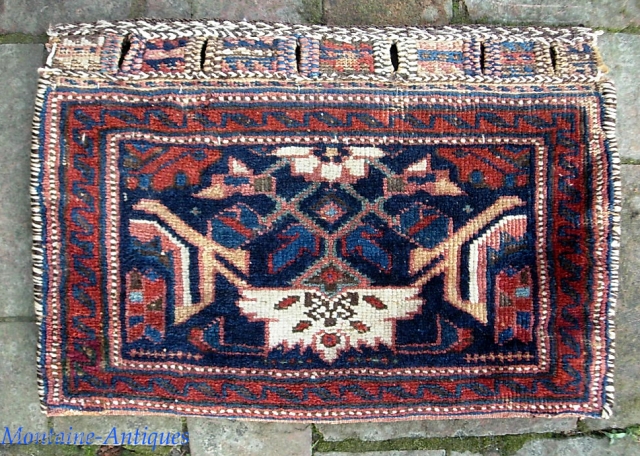 Afshar Chanta bag-- 12 x 18 inches. We acquired a pile of small tribal rugs. All as-found. I will post 6 per day until they are gone.

Some Khamsa motifs but I'm not  ...
