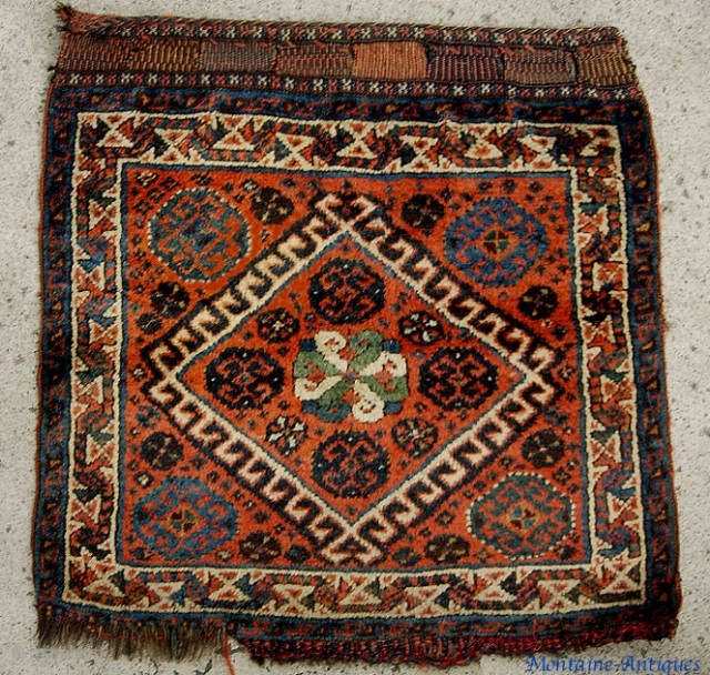 Qashqai bag face 1.10 x 1.10. 19th Century.  Unusual with red rather than more common blue ground. Most wonderful wool! $10 to ship anywhere in the US.     