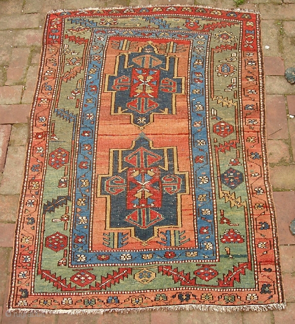 Ancient N.W. Bahkshaish? Karaja? Serapi? 3 ft 4 inches by 4 ft 7 inches. 19th century. The warps are a candy-cane with cotton and brown wool. Condition is low, even, w/ some  ...