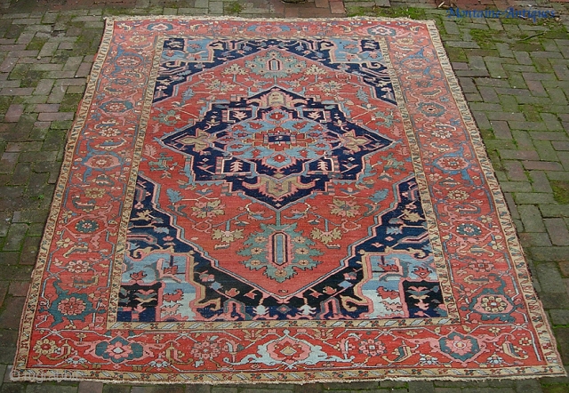 Old Heriz/Serapi 7 ft 3 X 11 ft 4 in. Real decorative thing with great colors and very uncluttered design. Unusual to find such wide borders on a smallish carpet. Well used--  ...