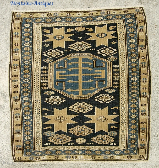 Shirvan-- 2 ft 6 by 2 ft. 9 Inches. Almost pushti size but squarish. Both end guards were rewoven and this workmanship was incredibly fine. Someone really loved this rug.   
