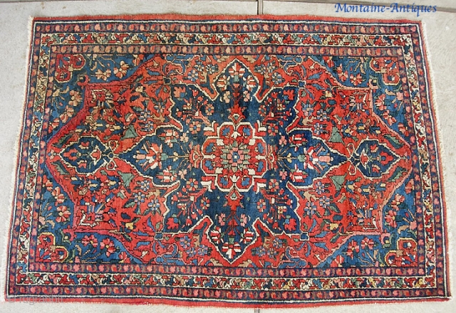 Bahktiari-- 4 ft 6 inches by 6 ft. 8 inches. Village rug with medallion. Nice and  thick with full pile.            