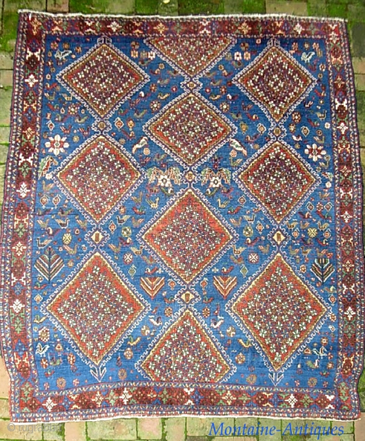 Afshar. 5 ft 6 in x 7 ft 0 in. Bright baby Blue field and herds of various animal. Overall fairly thick but shows a smattering of foundation here and there. Some  ...