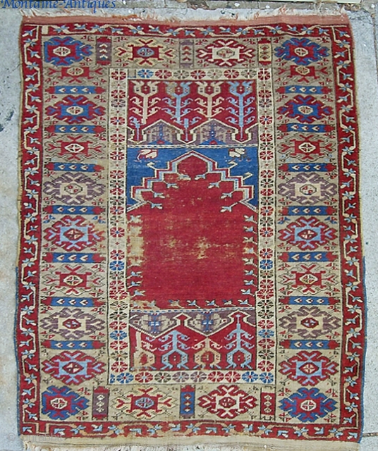 Old Turkish Konia, 3 ft 8 x 5 ft 4 inches. So called Konia-Ladik (I guess because of the tulip motifs). You can fit what I know about Turkish rugs on the  ...