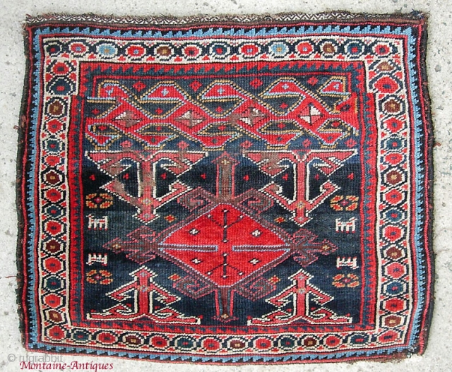 Persian bag face, 20 x 24 in.,  possibly Shahsavan, ca. 19th century.  Unusual bold design; lively and dramatic colors.  Some ferric oxidation in places; otherwise nice condition with originalsides  ...