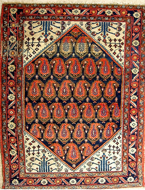  Kurdish, early 20th cent,   6'8" x 4'3";  really nice boteh field medallion and ivory corners with some cool figures. Darn good lookin old rug with thick pile. Nice  ...