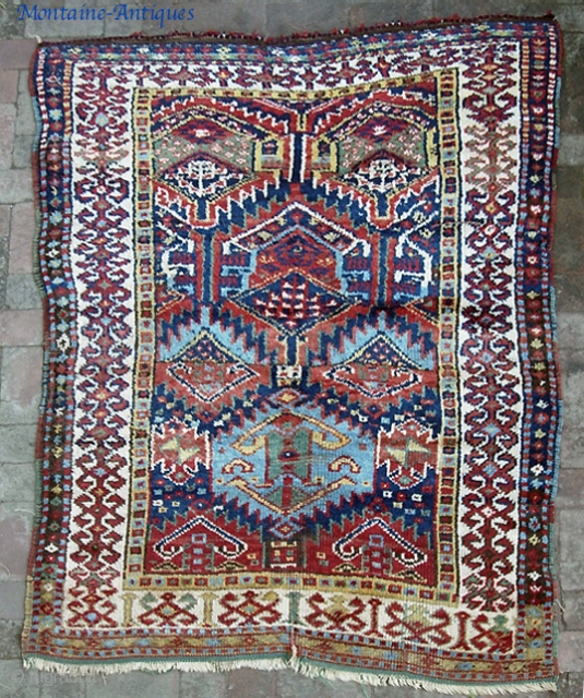 Old Kurd(?) 4 ft 2 x 6 ft 2 inches. Turkish? Persian? Caucasian? As usual, I am clueless. Whatever its origin, it has incredible colors. It is also very old-- possibly 19th  ...