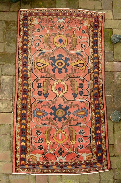 Hamadan-- 2 ft 6 in x 4 ft 11 in. Definitely Mehriban village piece. Very interesting design-- arabesques on soft salmon field. Gets lowish in the middle but no exposed foundation. Ends  ...