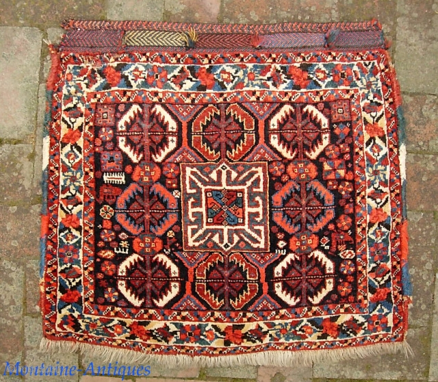 Basseri. 24 x 16 inches. Top shelf example of a highly sought Khamseh design. Sensational wool quality. Tiny fine knotting. Look carefully-- moth damage upper left corner. Aside from that condition is  ...