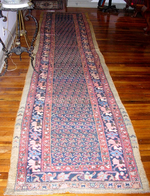 Kurdish Runner on wool foundation, c. 1900;  3 ft 1 inches by 13 ft. 3inches. Botehs and Earthtones. All vegetal dyes. Note the cute little tribal figures in the border on  ...