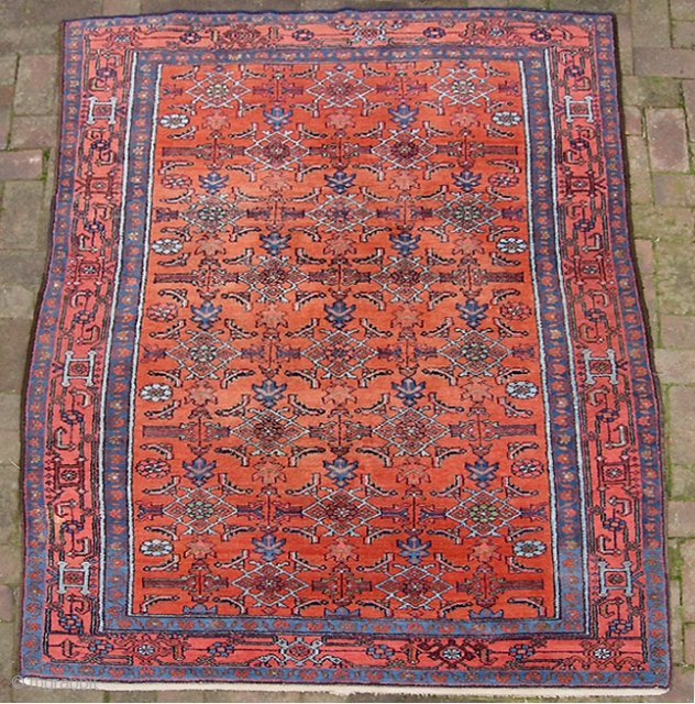 Malayer. 4 ft 8 inches by 6 ft 6 inches.  Good weave; Frosty nap wool. Original overcast and braided end weave still in good condition. Soft red field has a wonderful  ...