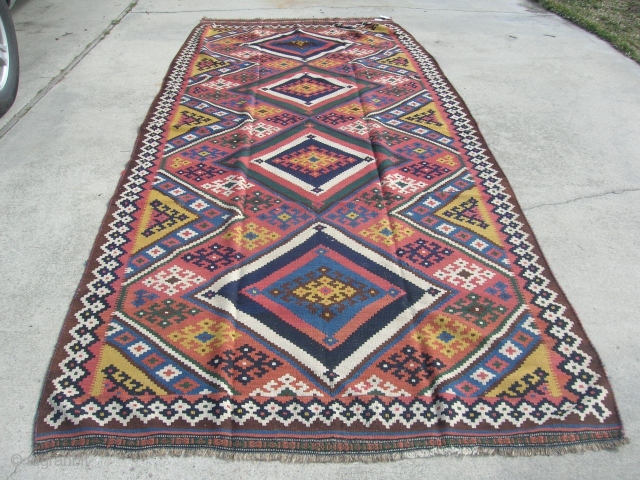 Here's a very nice flawless Ghashghai Kilim from the 1930's to 1940's (maybe even older than that), size is 5'8"x13'3", price is reasonable.  Thanks for looking.      