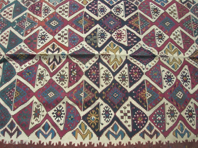 Here's an old turn of the century Turkish (anatolian) kilim comprised of two seperate peices woven together (common feature), size is 4'10"x9'5", one end is better off than the other (please see  ...