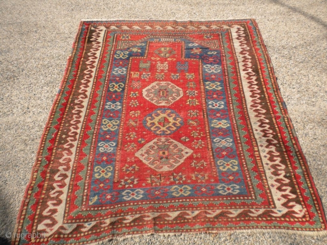 Nice 1890's Russian prayer rug with date woven in.  It's probably a Kazak.  Pile is low and even with foundation showing here and there.  Some of the brown has  ...