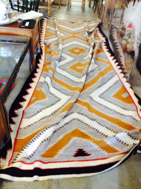 Measuring 63"x 145.5", regional vintage Navajo rug in mint condition.  More pics upon request.   Thanks for looking.             