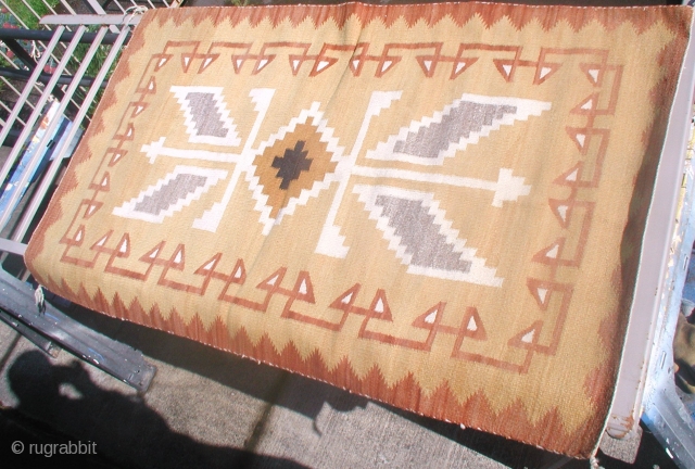 Fresh from an estate: an old Navajo measuring 37"x61" in good condition.  One picture is from one side, the other pic is from the other side      