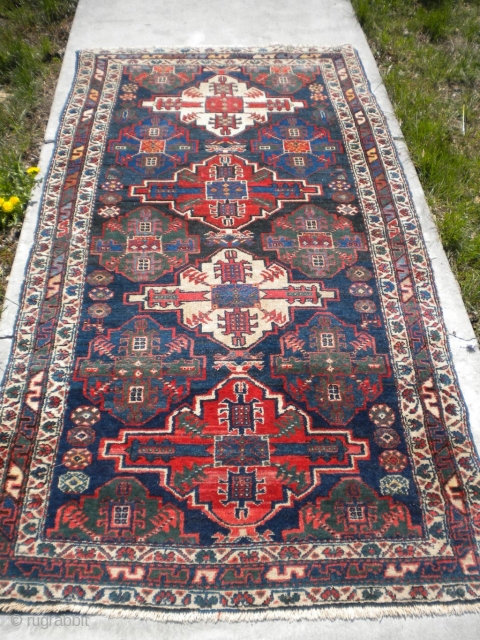 Fresh from an estate: A 1920's NW Persian tribal rug, size is 3'4"x6'4", good condition.  Just needs a little binding on one side.  Thanks for looking     