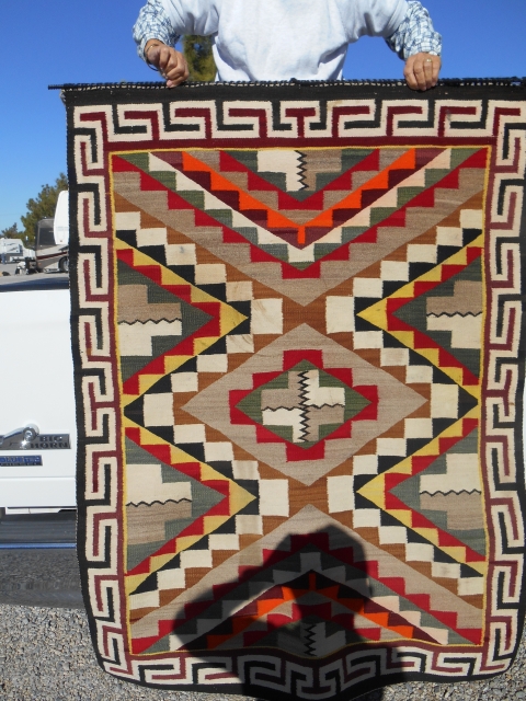 The RugPickers find as found: A turn of the century beautifully executed Teec Nos Pos weaving.  Size is 3'8"x 4'10".  I have a lot more pics who's files are too  ...