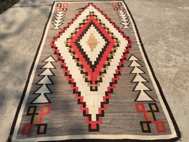 1930's-40's Navajo rug measuring 5'x 9'5" in remarkable condition.  Rug has 6 warps and 12 wefts per square inch. Rug has all original side stitching intact and is ready to go  ...