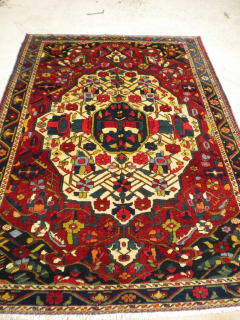 Here is a gorgeous Bakhtiari from the 1920's in the 5'x7' size range.  The size is 5'x7'8".  Unique rug!  Thanks!          