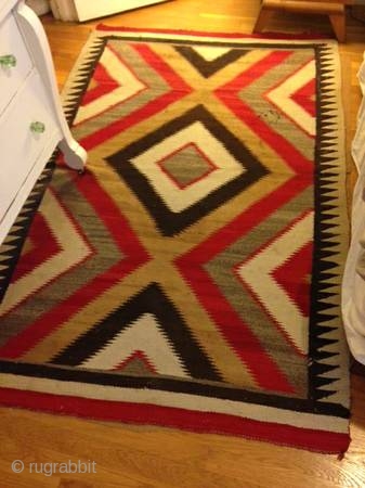 The Rug Pickers find as found: A vintage Navajo rug measuring 50"x 75", has two area's with holes, can E-mail more pics upon request.  All in all, nice colors, nice lay  ...