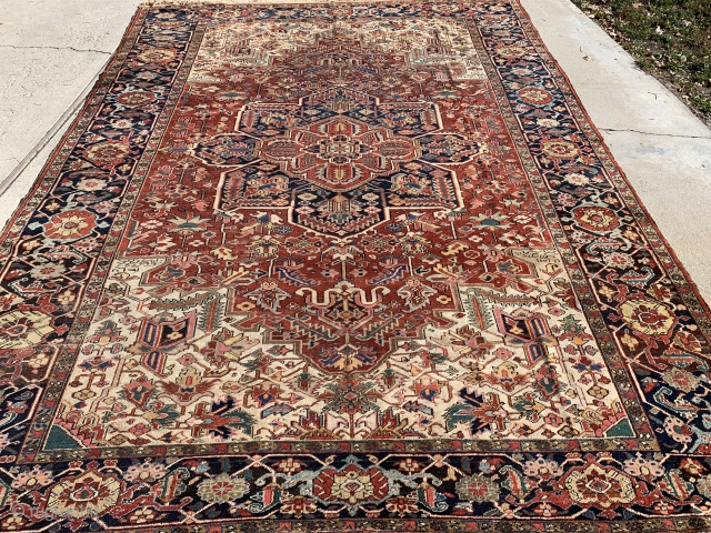 9’7”x 12’9” Heriz from 1900, dusted and washed, date and signature woven in rug, rug has some exposed foundation in a couple areas, low pile, rug is priced accordingly. No dry rot,  ...