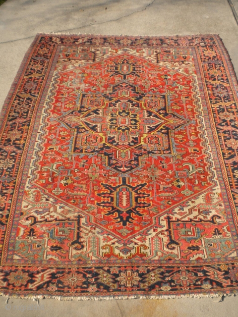 RUG-PICKERS FIND AS FOUND: A 1920'S BLANKET-SUPPLE-LIKE PERSIAN HERIZ, SIZE IS 8'X10'5", HAS 5 OR 6 AREA'S THAT HAS FOUNDATION SHOWING, ENDS ARE MISSING PART OF OUTER MINOR GUARD BORDER, BEAUTIFUL COLORS,  ...