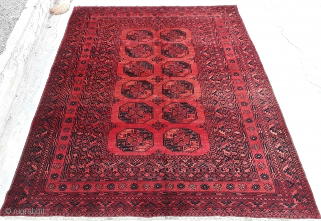 Very old Turkmen elephant feet rug will vegetable dyes and karakol wool. Excellent condition. size 295x225 cm                