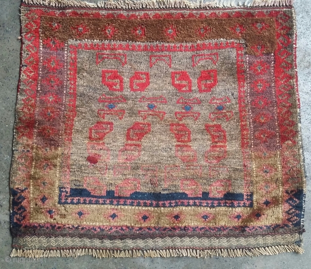 Old small balochi with unusual design. Size62x52 cm                         