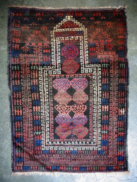 Stunning old balochi prayer rug with good rich colors.                        