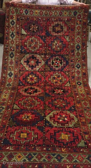 A 130 year old Mogan kazak carpet in very good condition.Mostly used as a wall hanging. Vegetables dyes vivid color. 
130×280            