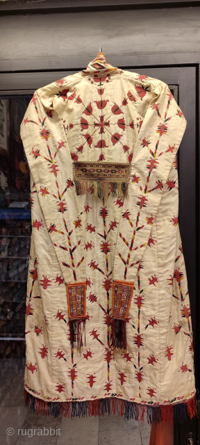 Turkmen vintage white chirpy. Some damages on the white silk background material.                     