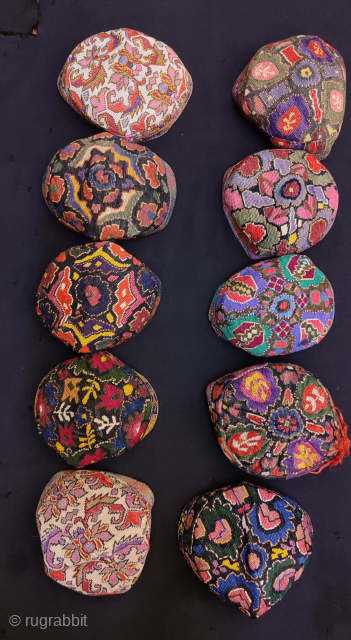 Group of Uzbekistan iroqi silk embroidered hats.