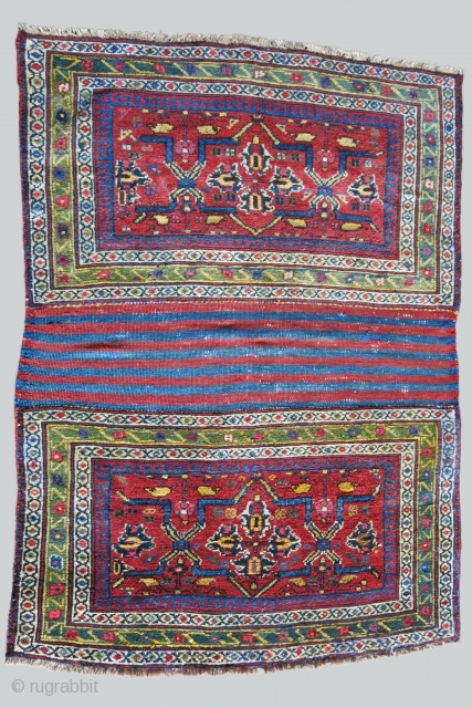 Afshar bedding bag - missing end panels. Saturated natural dyes and overall good pile and condition. A few small spot has repaired with old wool. Circa secodn half of 19th cent.Size :  ...