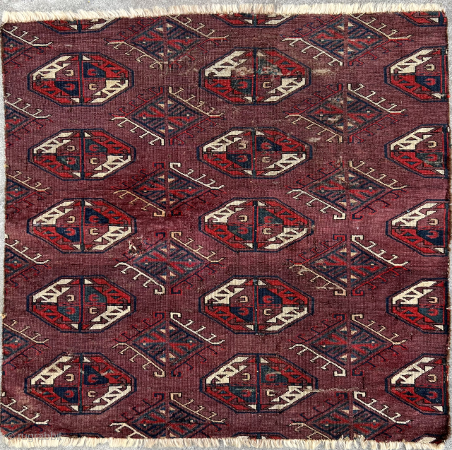 Archaic Yomut with a design S. Azadi calls Karadashli, a main carpet fragment circa 1800 with C guls and Dynak minors, deeply saturated color, uniform extensive wear, and verso sharkskin handle.
Please contact  ...