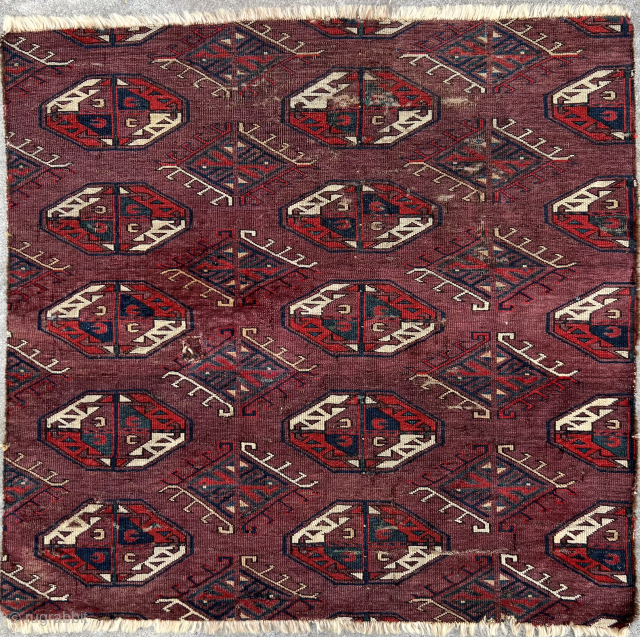 Archaic Yomut with a design S. Azadi calls Karadashli, a main carpet fragment circa 1800 with C guls and Dynak minors, deeply saturated color, uniform extensive wear, and verso sharkskin handle.
Please contact  ...