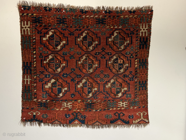 An early, possibly Kizyl Ayak Ersari chuval fragment perhaps from the late 18th century missing a column of guls with a rare and early border, unusual elem and minor guls. No analogies ...