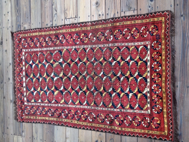 Antique Turkoman Beshir Rug with an uncommon design and natural dyes including an exceptional lemon yellow. Warps are goat hair. Some minor reweaves in the field. Size: 63 X 40in/160 X 109cm.  ...