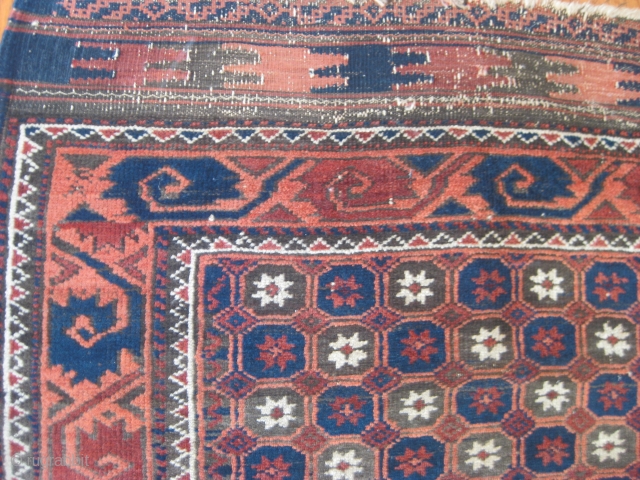 Late 19th C. Baluch rug with unusual star/lattice field design and curled-leaf border. Good pile in borders but lower in field. One old repair can be seen in second image. Good natural  ...
