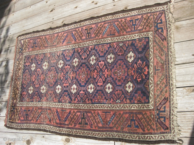 Mina Khani Belouch, ca 1880, nice blues, retaining partial kilim one end,
57" X 36". Hand washed. Bottom photo is of reverse side.           